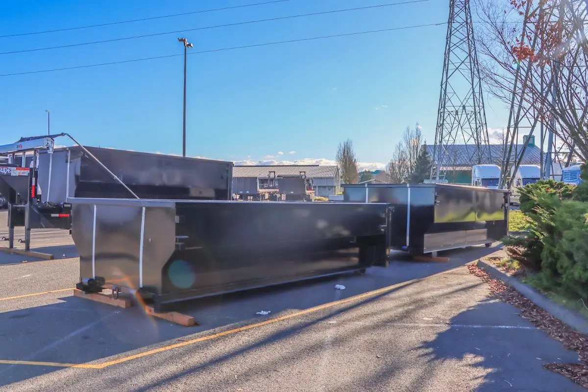 Roll-off dumpster ready for waste disposal at job site for 3 Yard Dumpster Rental in Glassmanor
